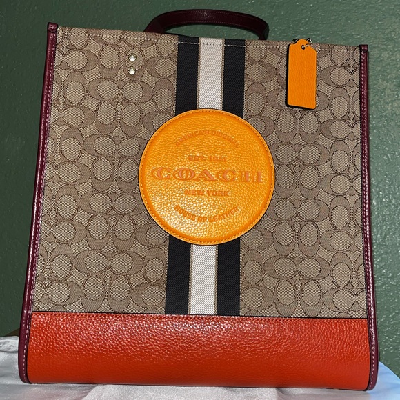 Coach Handbags - Coach Dempsey Signature Tote with Orange Patch